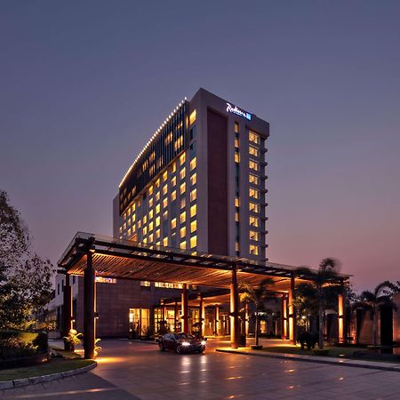 Radisson Blu Hotel Guwahati Buitenkant foto The Royal
